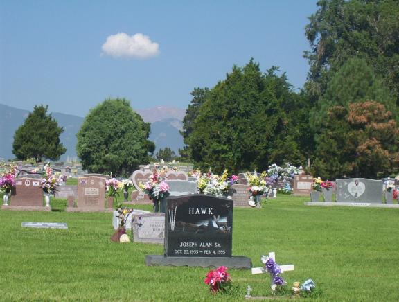 photo of gravestones and flowers at Evergreen Cemetery 
