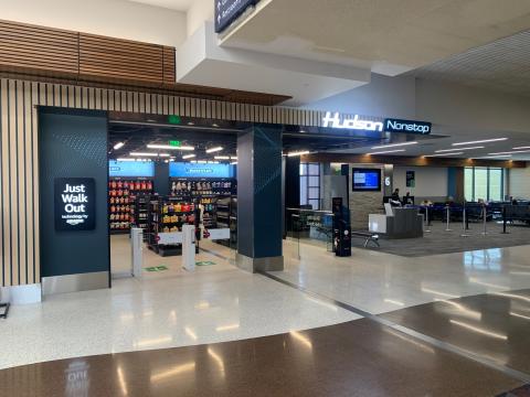 Hudson Nonstop at the Colorado Springs Airport. A sign is on the outside that reads "Just Walk Out technology by Amazon"