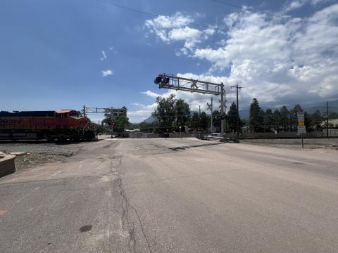 South view of existing Royer Street railroad crossing just north of Las Vegas Street with train traffic