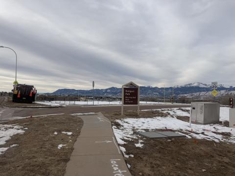 Rampart Park on a gloomy afternoon. There are trace amounts of snow on the ground.