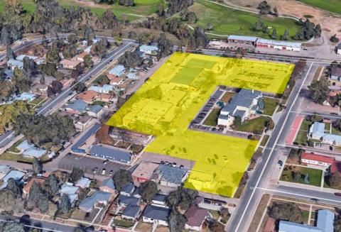 Aerial view of Golf Acres on North Hancock Avenue. The City-owned buildings are highlighted.