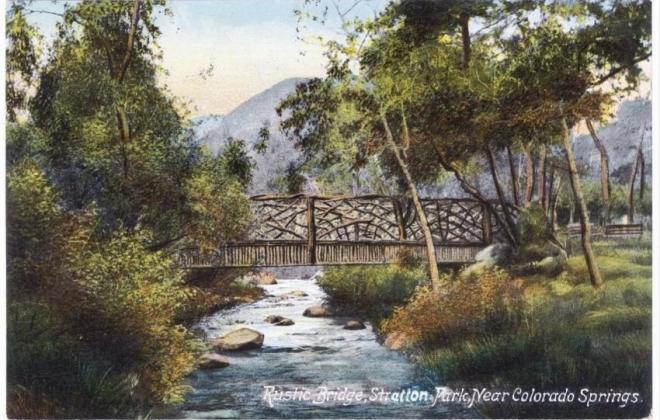 A postcard of the Stratton Park Bridge, reads "Rustic Bridge, Stratton Park, near Colorado Springs"