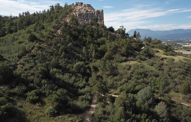 Photo looking southwest at Austin Bluffs Open Space. Pulpit Rock is visible in the background of the image.