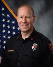 Portrait photo of Fire Marshal Kris Cooper